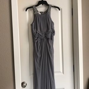 Long, gray bridesmaid's dress.